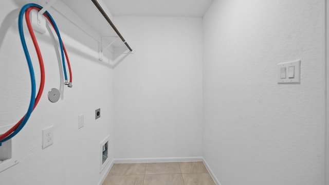 214 Fulton Station Dr, Houston, TX 77009 - washroom featuring hookup for an electric dryer, light tile patterned floors, laundry area, baseboards, and hookup for a gas dryer