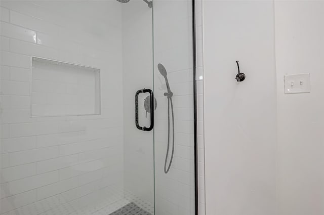 bathroom featuring walk in shower