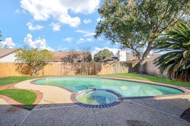 view of pool featuring an in ground hot tub