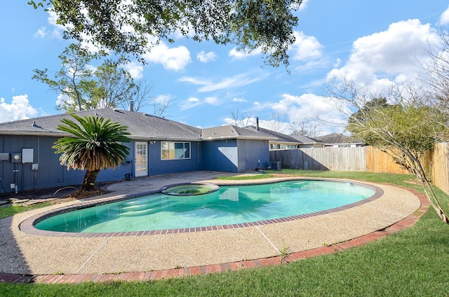 view of swimming pool featuring a hot tub and central AC unit