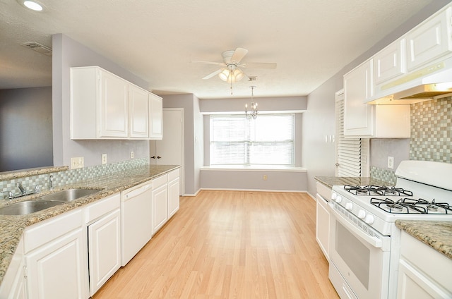 kitchen featuring white cabinetry, sink, white appliances, and light hardwood / wood-style floors