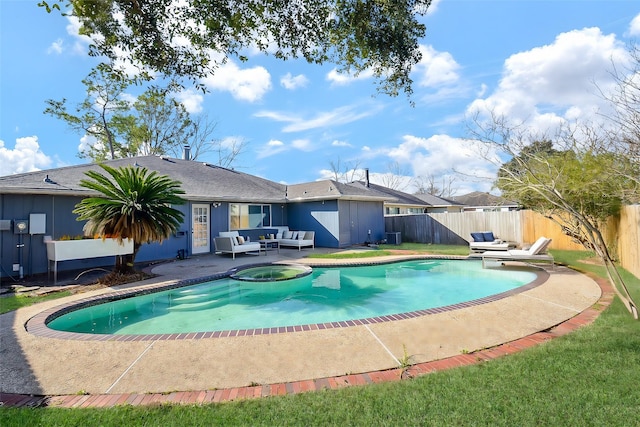 view of pool with an outdoor living space, a hot tub, central AC unit, and a patio area