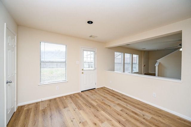 entrance foyer featuring light hardwood / wood-style floors