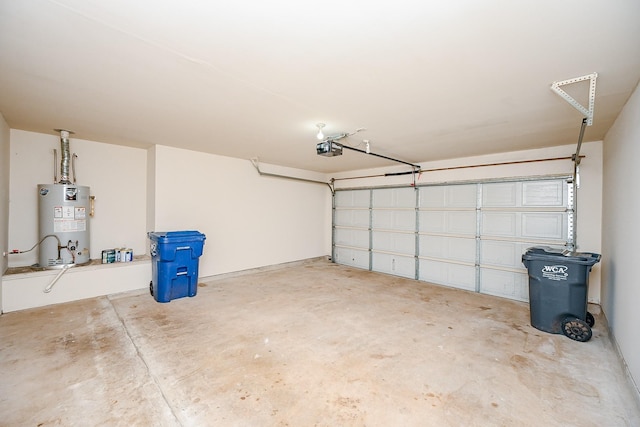 garage with a garage door opener and gas water heater