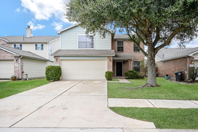 view of property featuring a garage and a front yard