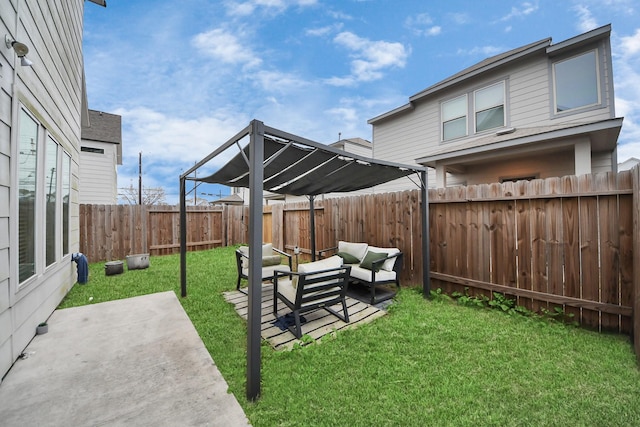 view of yard featuring a patio, a fenced backyard, and an outdoor living space