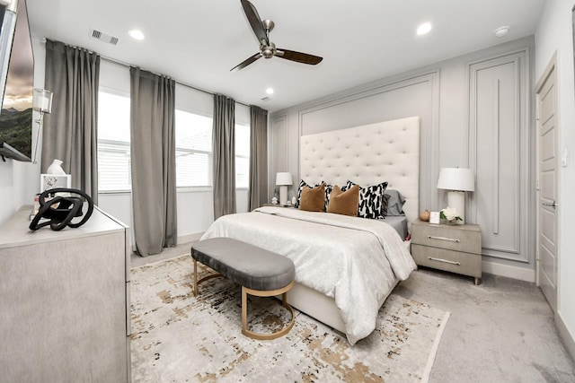 carpeted bedroom with ceiling fan