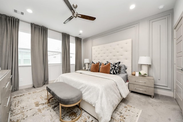 bedroom featuring visible vents, baseboards, recessed lighting, ceiling fan, and light colored carpet