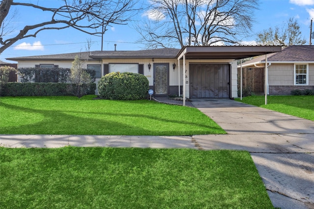 single story home featuring a carport and a front lawn