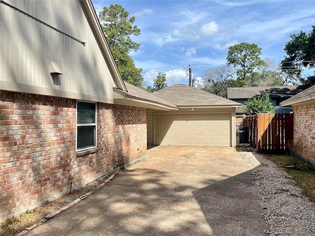 view of property exterior with a garage