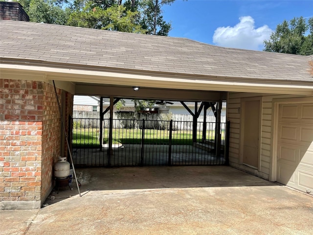 exterior space with a carport