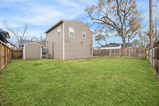 view of yard with central AC