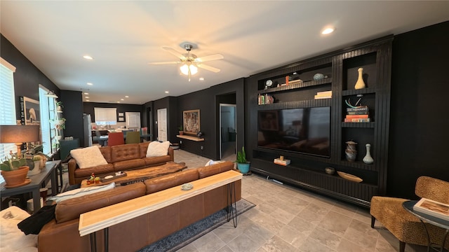 living room featuring ceiling fan