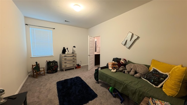 bedroom with light colored carpet