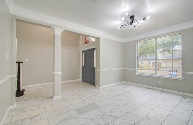 empty room featuring marble finish floor, ornamental molding, decorative columns, and baseboards