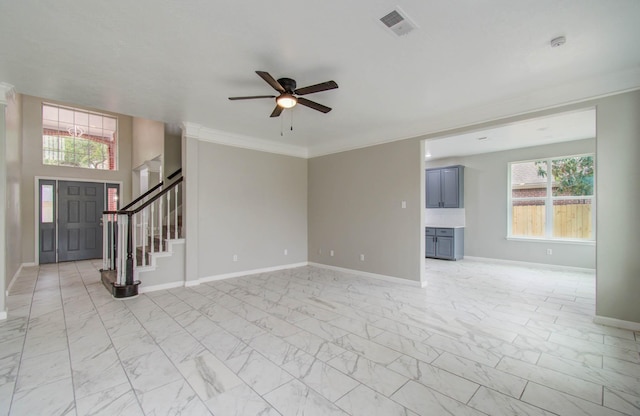 interior space with marble finish floor, visible vents, a ceiling fan, baseboards, and stairs