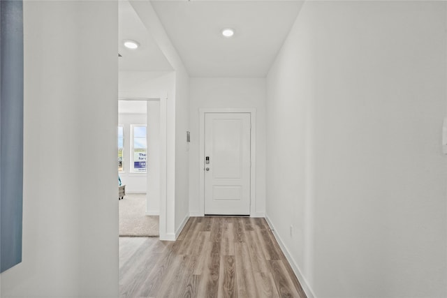 hallway featuring light wood-type flooring