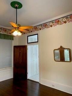 unfurnished room featuring crown molding and dark hardwood / wood-style floors