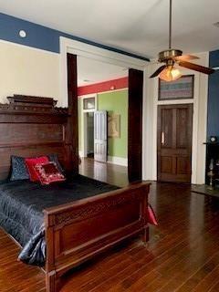 bedroom featuring hardwood / wood-style flooring