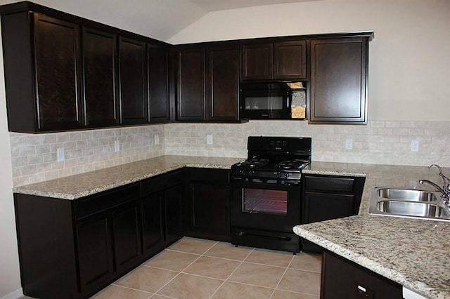 kitchen featuring a sink, backsplash, black appliances, and light tile patterned floors