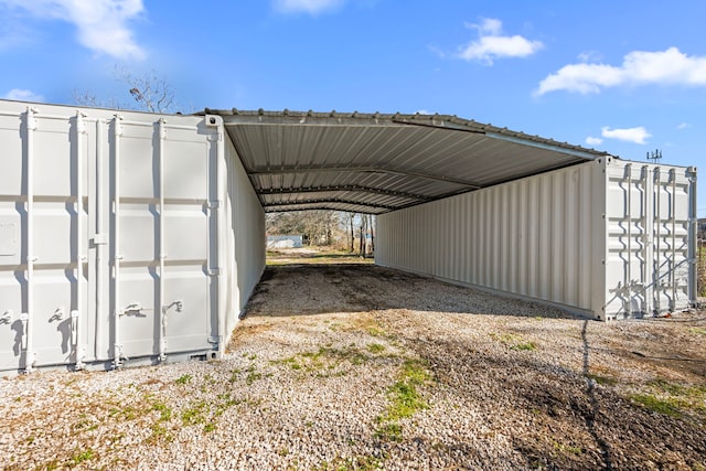 view of car parking with a carport