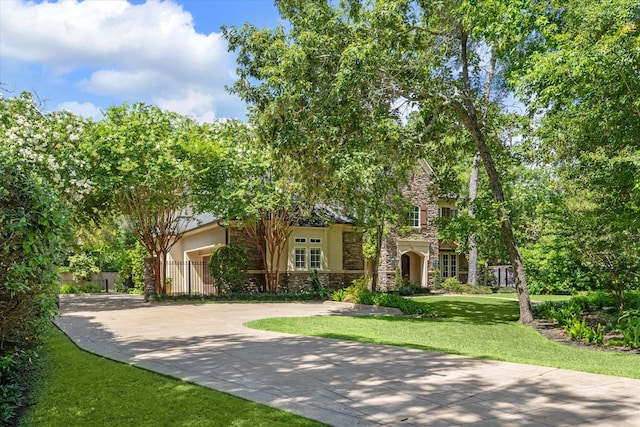 view of front of home with a front lawn