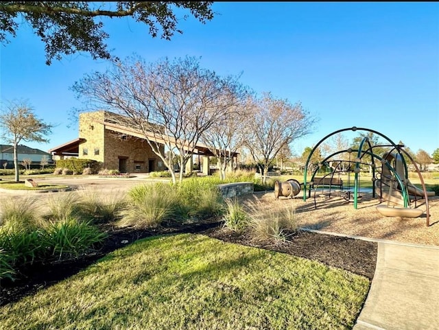 view of yard featuring playground community