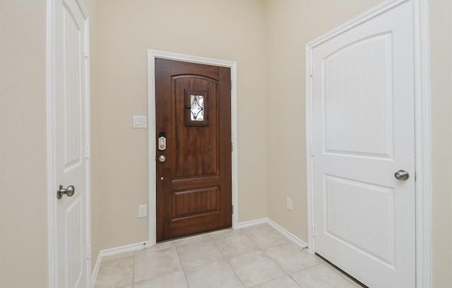 view of tiled entrance foyer