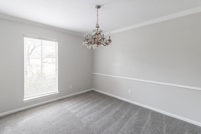 carpeted empty room with crown molding and a chandelier