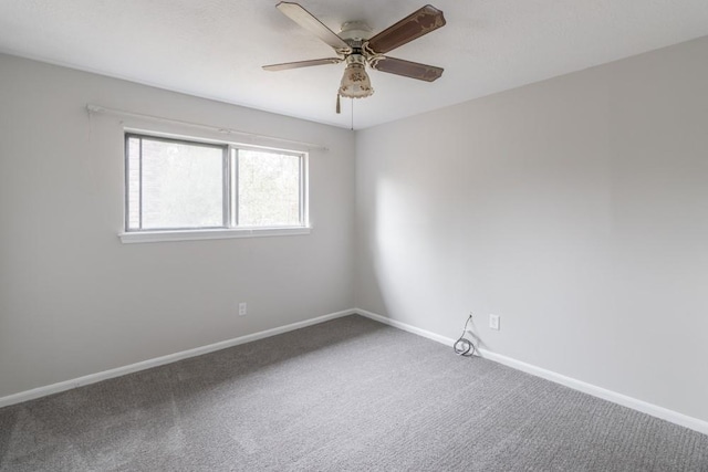 unfurnished room featuring carpet flooring and ceiling fan