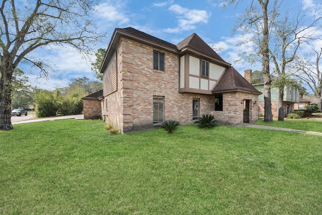 view of property exterior featuring a yard