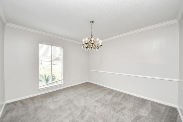 unfurnished room with crown molding, carpet flooring, and a notable chandelier