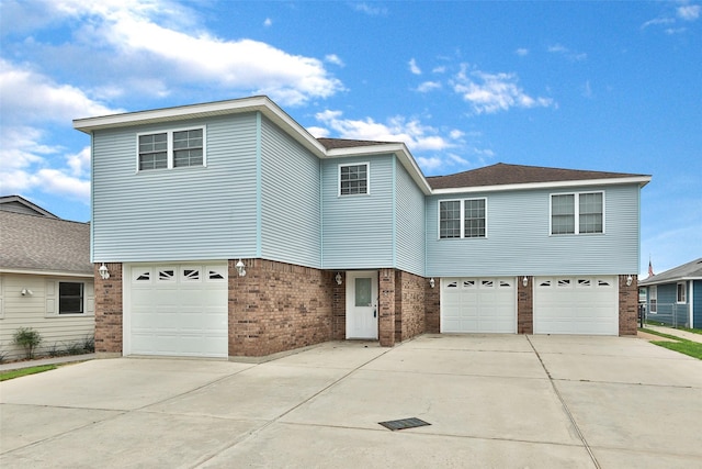 front facade with a garage