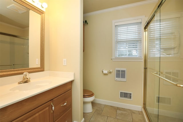 bathroom with heating unit, crown molding, a shower with shower door, and toilet