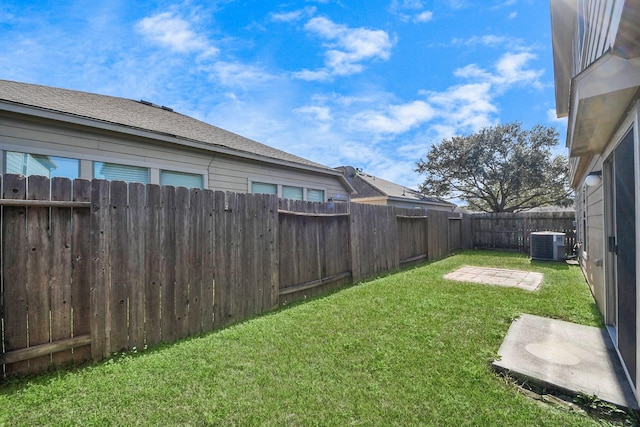 view of yard featuring central AC unit