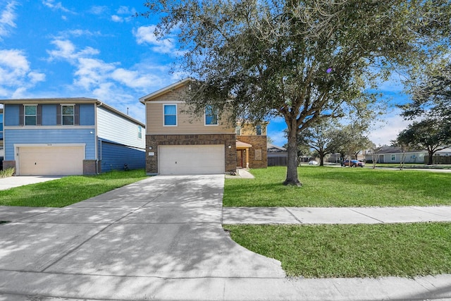 view of front of property with a garage and a front yard