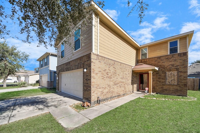 view of front of house featuring a garage and a front yard