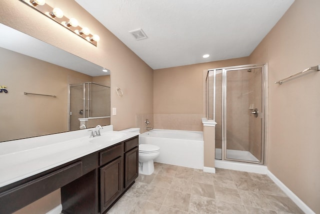 full bathroom featuring vanity, toilet, and separate shower and tub