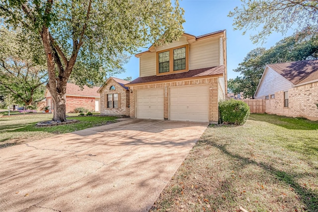 view of front property featuring a garage and a front yard