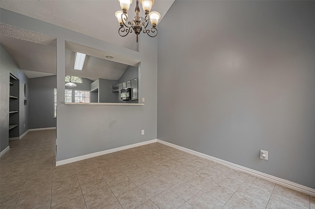 interior space featuring lofted ceiling, a textured ceiling, an inviting chandelier, and built in shelves