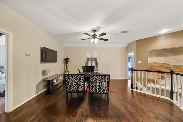 interior space with ceiling fan and dark hardwood / wood-style flooring