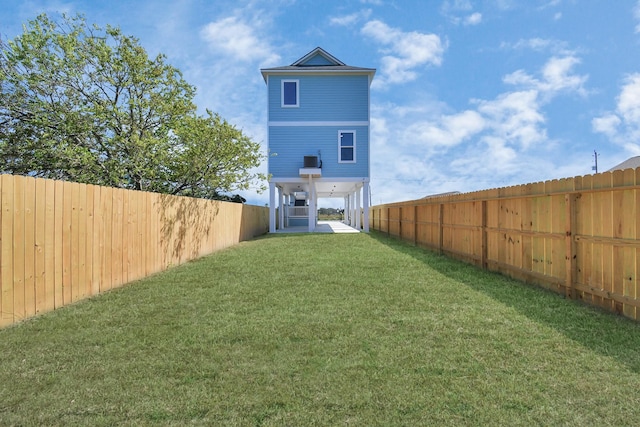 rear view of property with a lawn