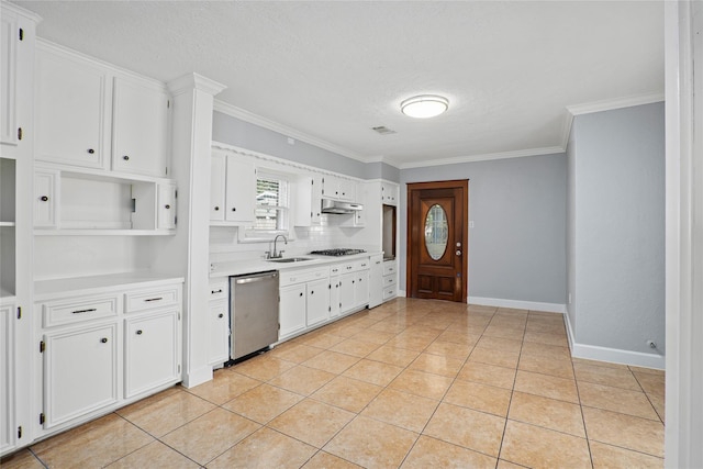 kitchen featuring sink, crown molding, light tile patterned floors, stainless steel appliances, and white cabinets