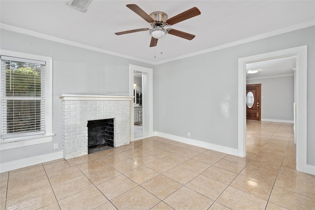 unfurnished living room with light tile patterned floors, ornamental molding, a brick fireplace, and ceiling fan