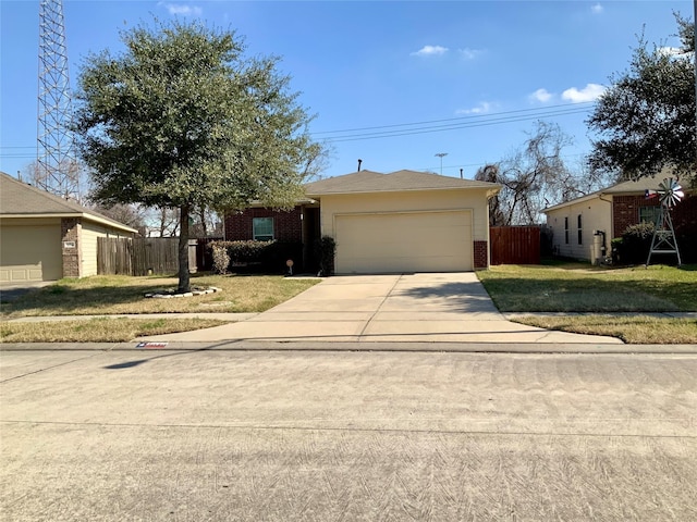 single story home featuring a garage and a front yard