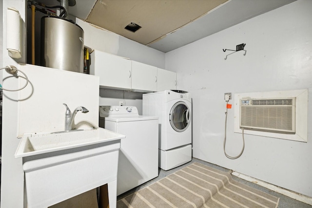 clothes washing area with separate washer and dryer and a wall unit AC