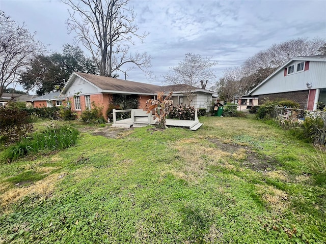 view of yard with a deck