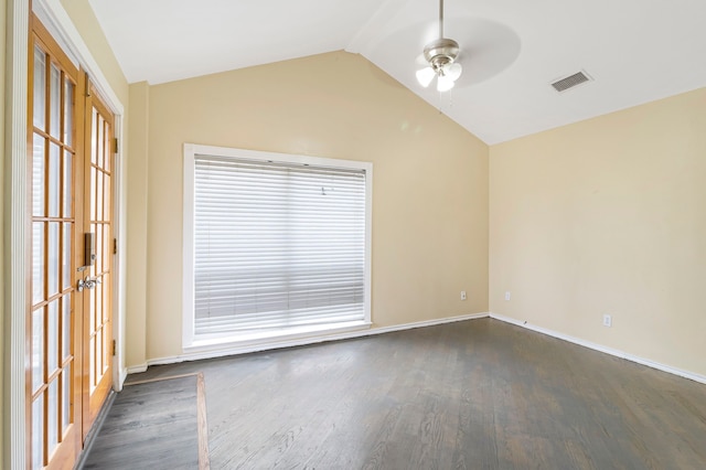 unfurnished room with french doors, vaulted ceiling, dark hardwood / wood-style floors, ceiling fan, and a healthy amount of sunlight