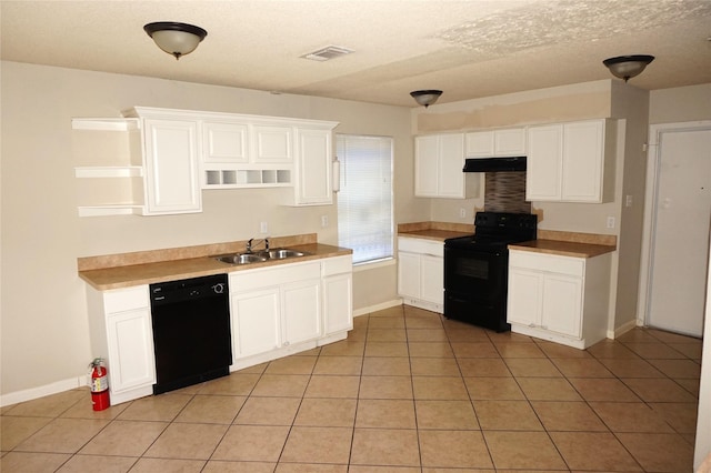 kitchen featuring white cabinets, light tile patterned floors, and black appliances