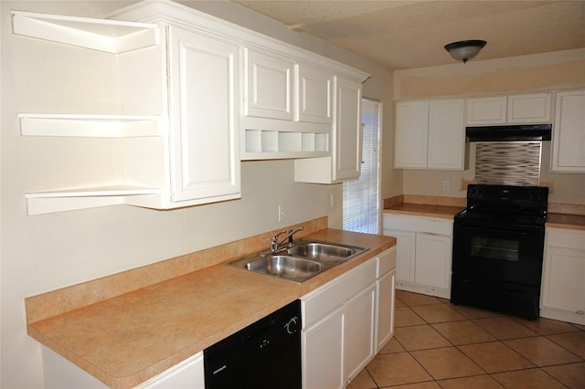 kitchen featuring white cabinetry, light tile patterned floors, sink, and black appliances